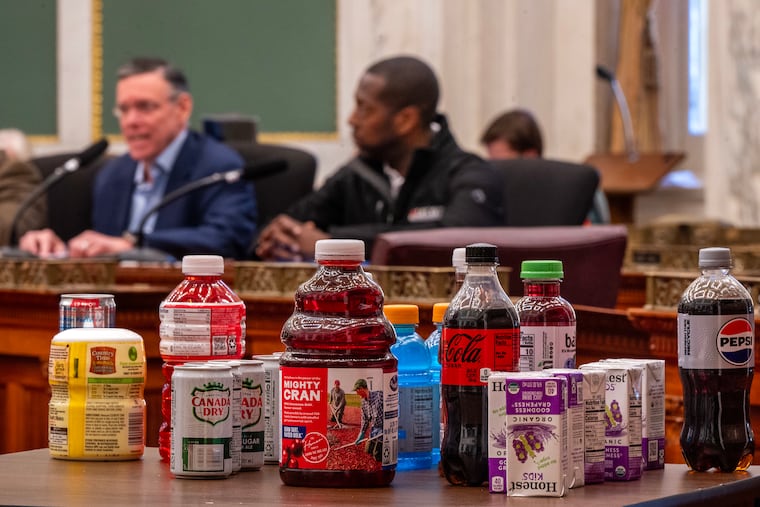 A collection of sugary drinks is on display in City Council chambers on Oct. 27 during a hearing on the city's tax on sodas and other sweetened beverages.