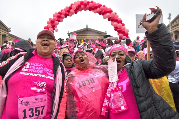 From left, Joy Adams, Harriette Bishop, and Stella Brown, minutes before walking in the 2018 Susan G. Komen Philadelphia Race for the Cure at the Philadelphia Museum of Art on Sunday, May 13, 2018.