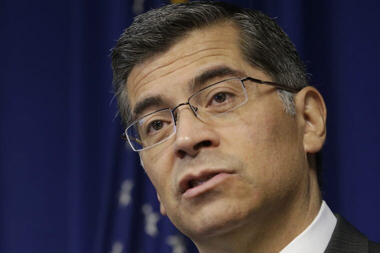 California Attorney General Xavier Becerra speaks at a news conference in Sacramento, Calif. California is suing the Trump administration over its decision to add a question about citizenship to the 2020 U.S. Census. In announcing the lawsuit Tuesday, March 27 Becerra says adding such a question is a reckless decision that would violate the U.S. Constitution and cause a population undercount.
