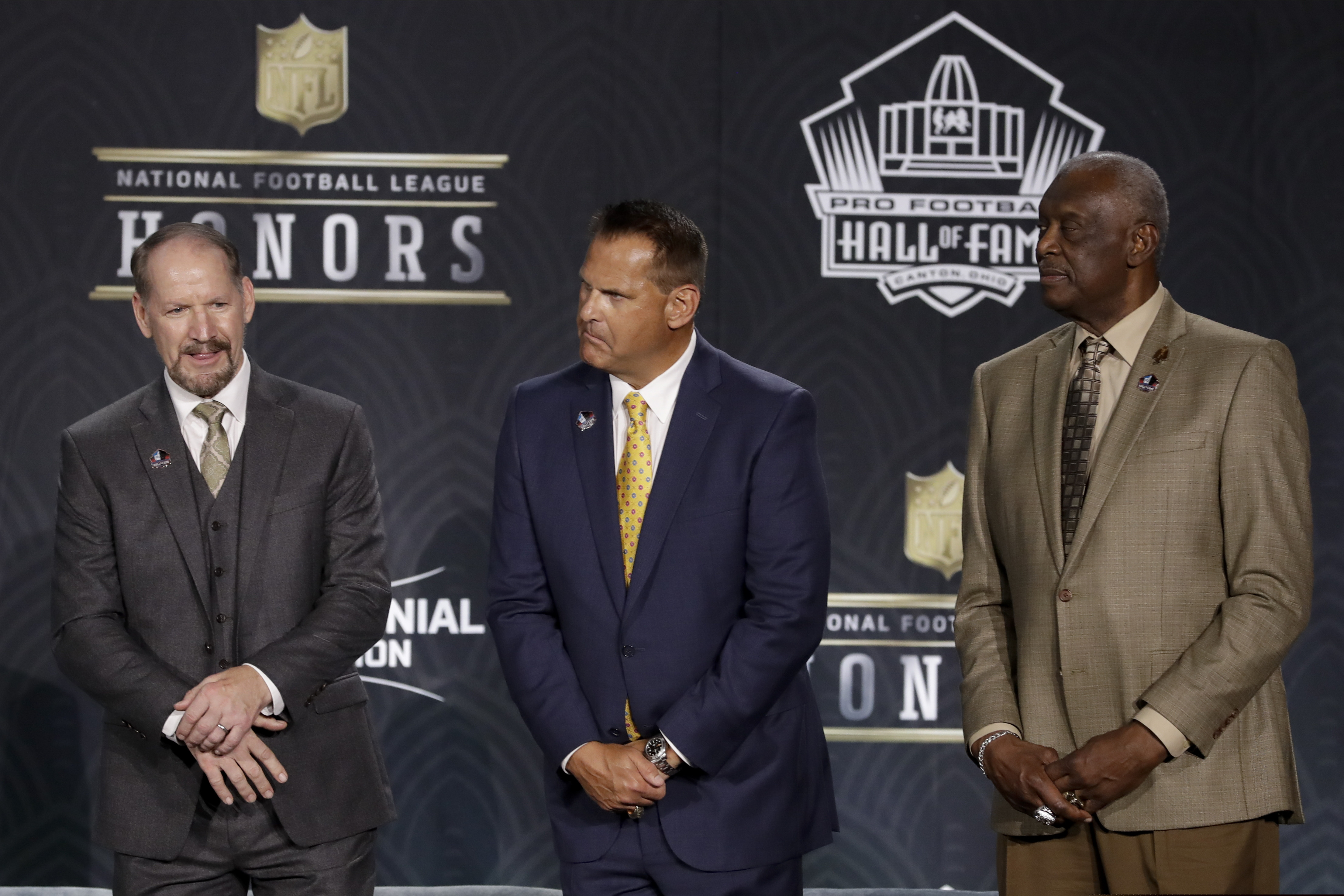 Former Eagles wide receiver Harold Carmichael (far right) and the other members of the Pro Football Hall of Fame class of 2020 are going to have to wait another year to receive their bronze busts.