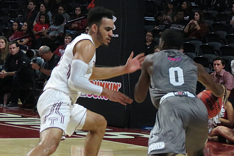 Temple’s Obi Enechionyia guards Jefferson’s Price Hickson during Thursday’s charity exhibition at the Liacouras Center.