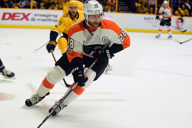 Philadelphia Flyers center Claude Giroux (28) skates with the puck against the Nashville Predators in the first period of an NHL hockey game Tuesday, Oct. 10, 2017, in Nashville, Tenn. (AP Photo/Mike Strasinger).