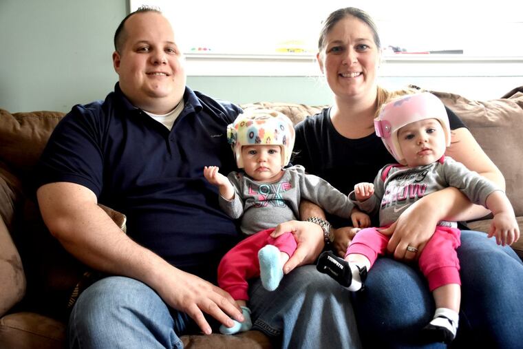 Attached is photo of Lou and Gina Gana, with twins Hailey (left) and Harper (right).