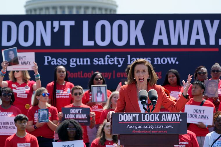 House Speaker Nancy Pelosi speaks during a protest near Capitol Hill.