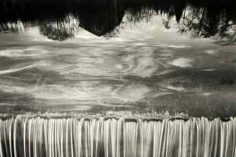 Jerry Uelsmann's untitled print is in an Allentown Art Museum show, "A Force for Change," of works by prominent African American artists who received grants from the Julius Rosenwald Fund.