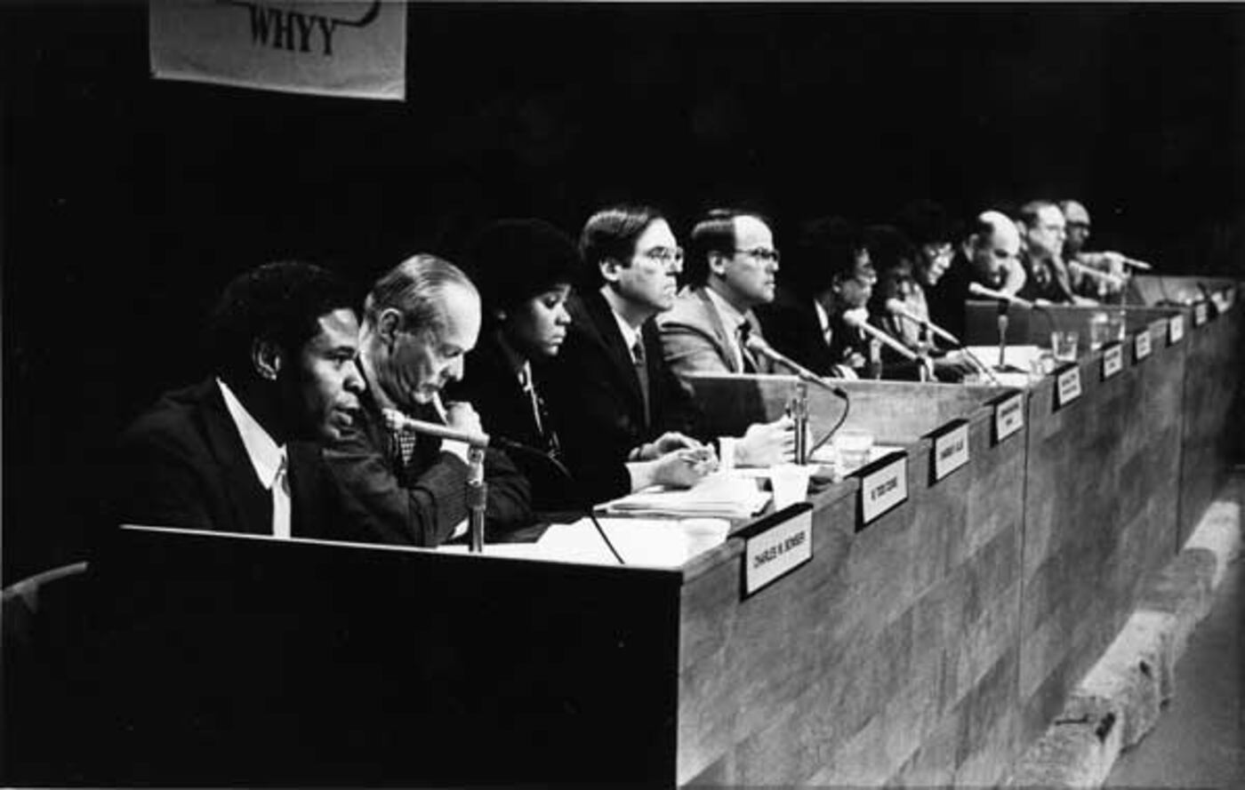 The MOVE Commission releases their report on March 6, 1986. Attorney Charles Bowser speaks in foreground.