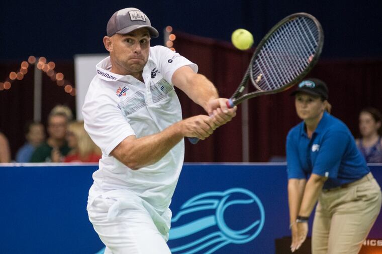 Andy Roddick returns a serve for the New York Empire as a visiting player against the Freedoms last season. He will join the Freedoms this year for one match on July 25.