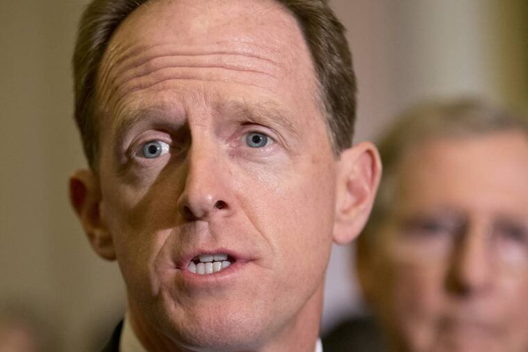 Sen. Pat Toomey, R-Pa. speaks with reporters on Capitol Hill in Washington. (AP Photo/J. Scott Applewhite, File)