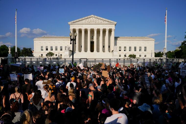 Protesters filled the street in front of the Supreme Court after the court's decision to overturn Roe v. Wade in Washington on Friday.