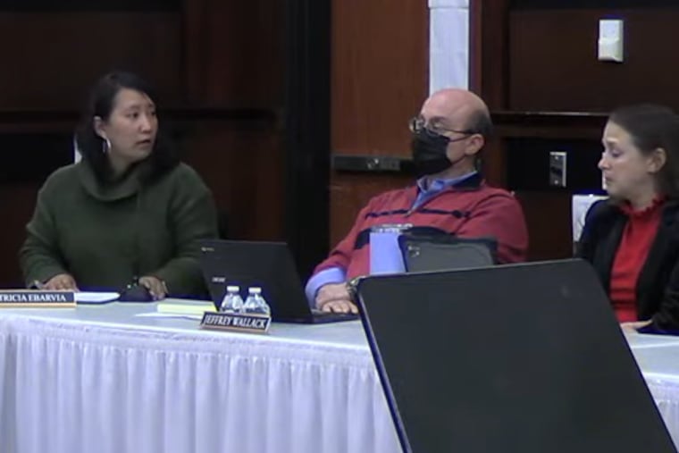 Tricia Ebarvia, left, a newly elected Upper Dublin school board member, explains her decision to resign to fellow board members during a committee meeting Wednesday Dec. 13.