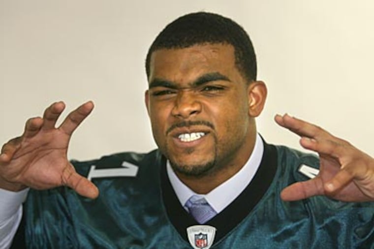 The Eagles traded up to the 13th pick to select defensive end Brandon Graham of Michigan. (Charles Fox/ Staff Photographer)