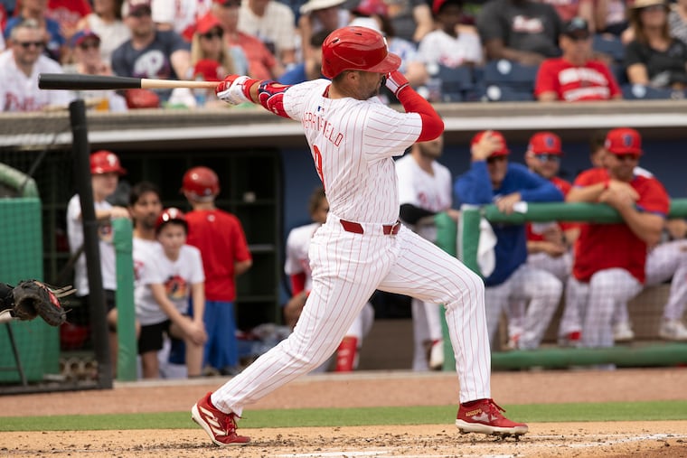 Phillies’ Whit Merrifield bats on March 1. On Saturday, Merrifield drove in two runs in a tie against Miami.