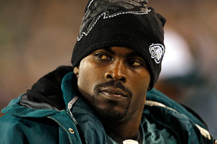 Michael Vick will try to maintain his focus on football and not on the buzz surrounding his resurgence. (Yong Kim / Staff Photographer)