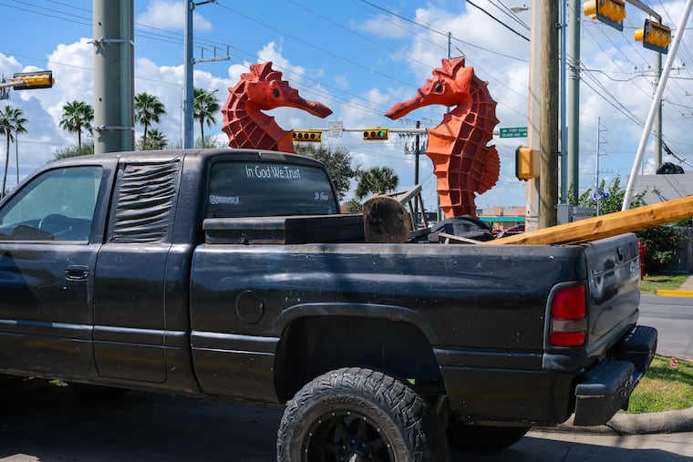 A truck parked outside Bobz Castle gift shop in Port Isabel, Texas, in 2024. The photograph is featured in a Berlin exhibition titled “Roadside USA — There have been better days.”