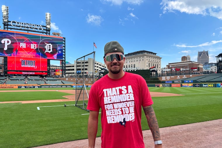 Orion Kerkering modeling the Phillies' new shirt.