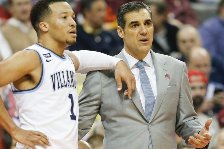 Villanova head coach Jay Wright talks to guard Jalen Brunson during a break against Radford.