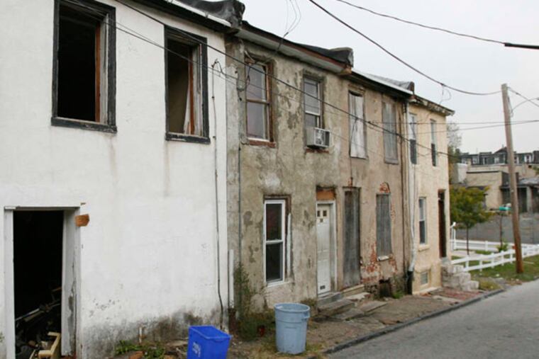 Abandoned row homes in the city's Germantown section.