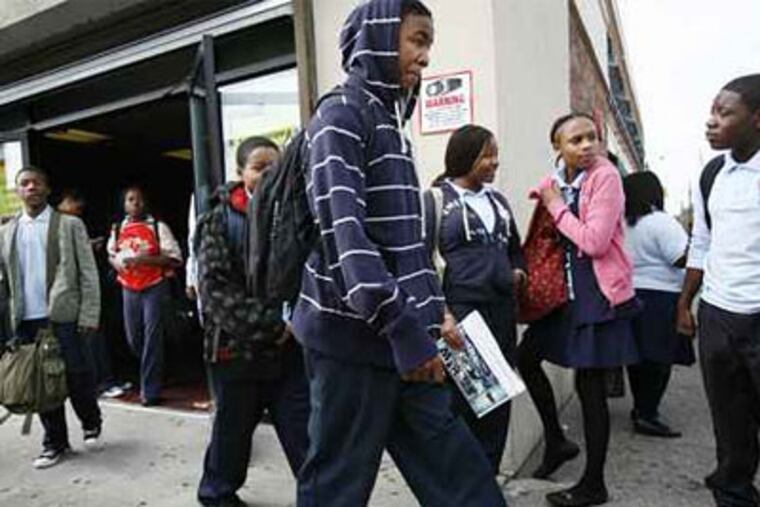 Students leave Germantown Settlement Charter School at the end of the school day. (Eric Mencher/Staff Photographer)