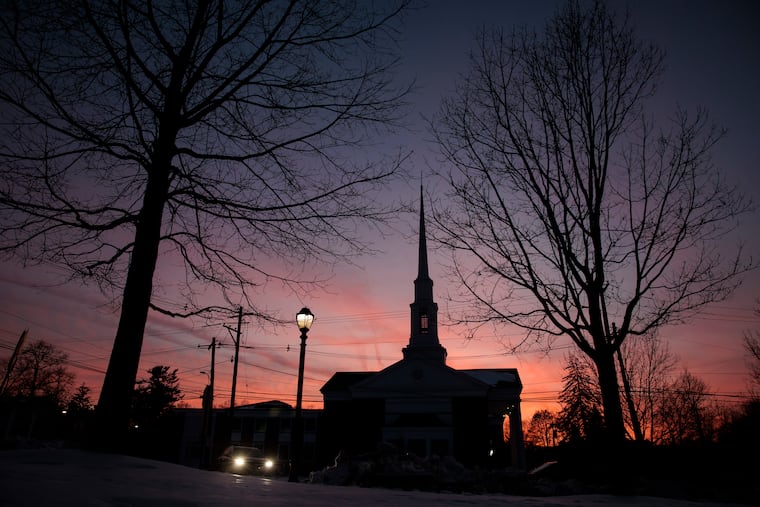 The sun sets over Wayne United Methodist Church on Tuesday, Feb. 10, 2026 in Wayne, Pa