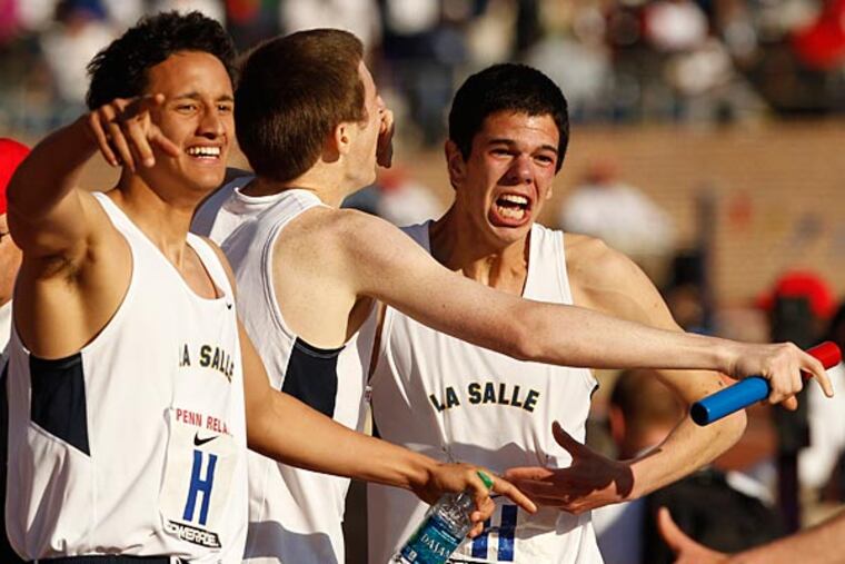 LaSalle College celebrates their HS boys' Distance Medley Championship
at Penn Relays Franklin Field on Friday, April 26, 2013. (Ron Cortes
/ Staff Photographer)