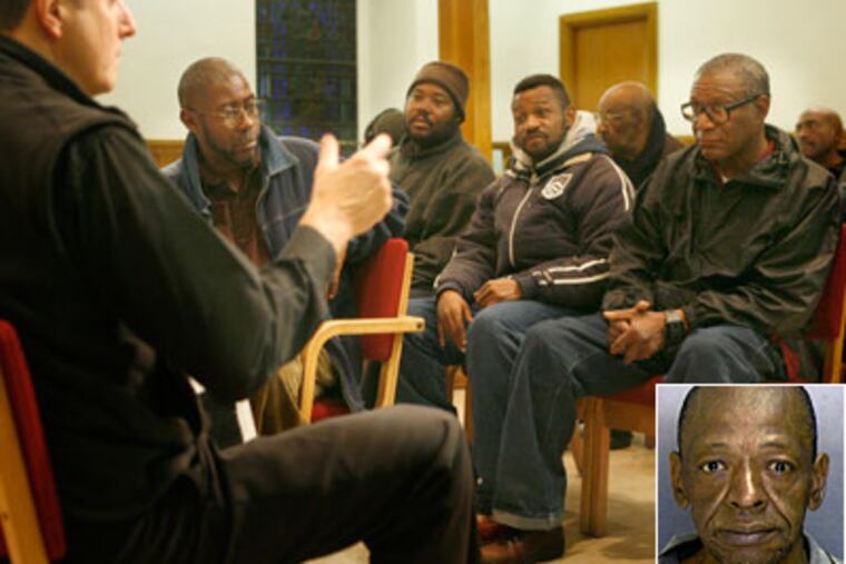 The Rev. Robin Hynicka, left, of Arch Street United Methodist Church, talks to a group of homeless men about the unidentified homeless man (inset) who was shot by police on July 3. (Charles Fox / Staff Photographer )