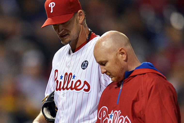 A.J. Burnett walks off the field after suffering an injury against the Marlins. (Drew Hallowell/Getty Images)