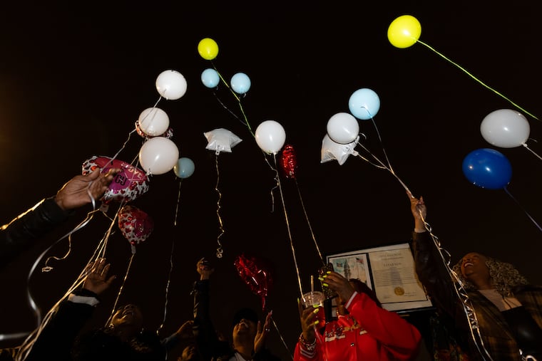 Balloons with messages written on them launch after the 25th anniversary of the Lex Street massacre recognition ceremony at Lucien Blackwell Community Center on Sunday, Dec. 28, 2025, in Philadelphia.