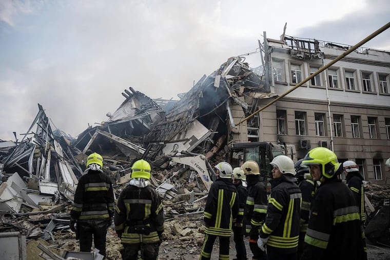 In this image provided by the Ukrainian Emergency Service, emergency service personnel work at the site of a destroyed building after a Russian attack in Odesa, Ukraine, Thursday.