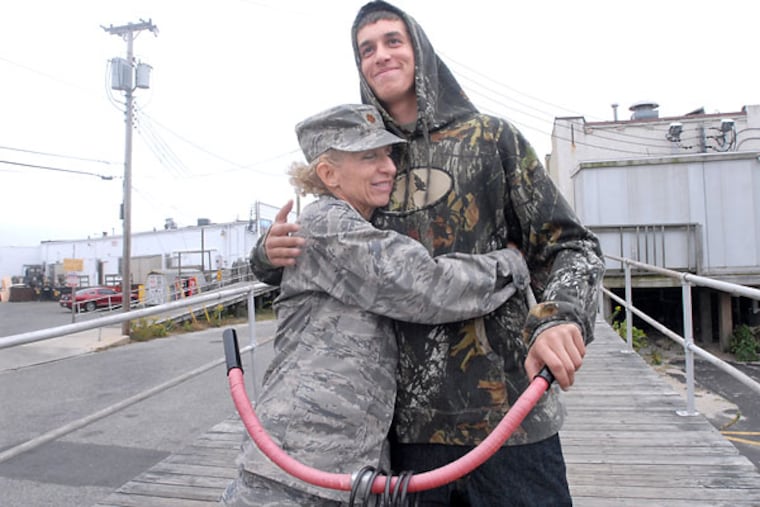 Maj. Roxellen Auletto in Ocean City, N.J., with son Beckett Bayer, 18, one of her three children.
