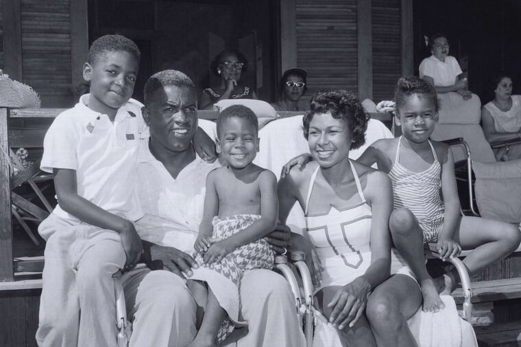 Jackie and Rachel Robinson with their children - Jackie Jr., David, and Sharon - by the pool at Grossinger's Resort in New York, from Ken Burns' documentary "Jackie Robinson" on PBS.