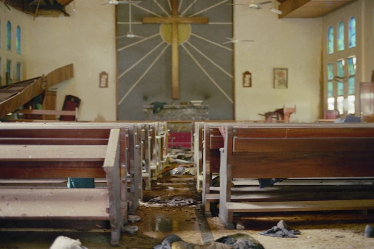 On July 29, 1990, St. Peter’s Lutheran Church in Monrovia became the site of one of the first civilian massacres in the Liberian Civil Wars. Six hundred civilians were killed by soldiers loyal to then-President Samuel Doe. The bodies were left to rot in the church for two months until volunteers entered the building to reclaim the bodies in October 1990, when this photo was taken.