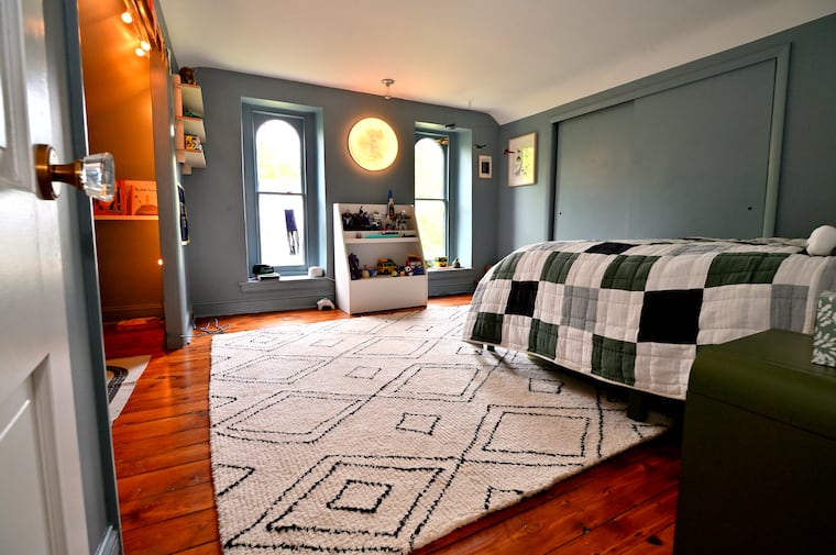 The second bedroom on the third floor of the home of John Giordano and Brooke Saylor.