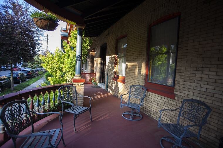 The owner fell in love with West Philadelphia while she was a Penn student. She later bought this five-bedroom, 2½-bath semi-detached Queen Anne house on a tree-lined street a 10-minute walk from campus.