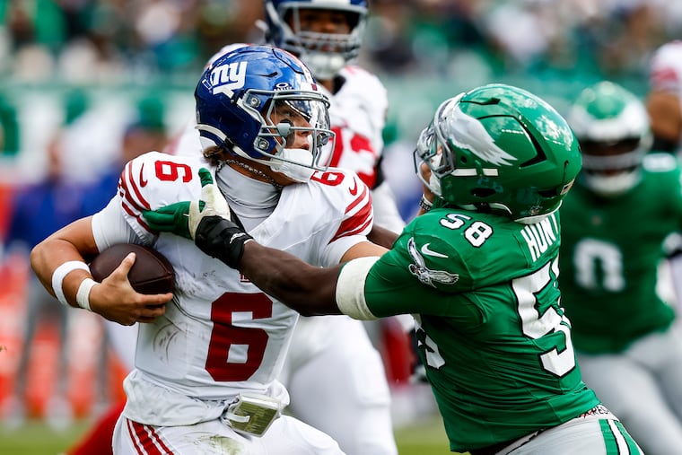 Jaxson Dart (left) did some good things as a rookie. Is he ready to take the next step and lead the Giants to consistent winning?