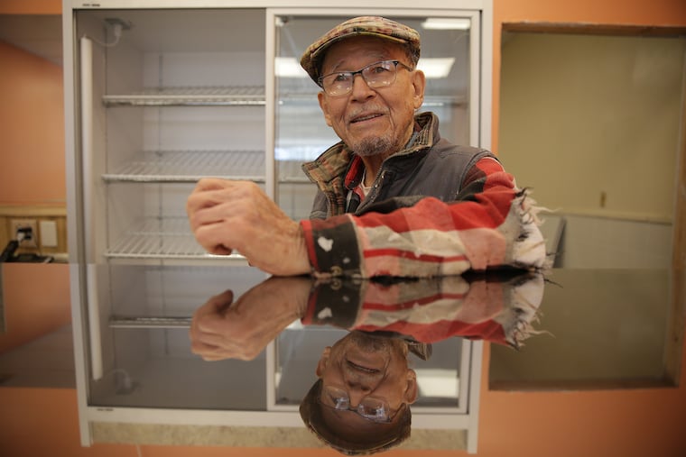 Ray Boutwell pauses as he works to open his new shop in Voorhees, NJ on March 19. Boutwell, 92,is coming out of retirement to open a new bakery specializing in booze-flavored as well as conventional cupcakes and other sweets, including what he calls 'Philadelphia Butter Cake.'
