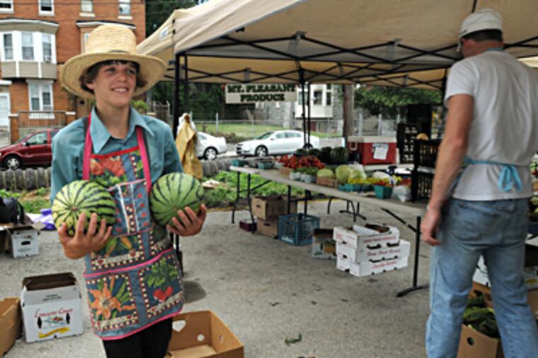 A farmers market. Social conditions, such as poverty and poor nutrition, contribute greatly to one's health. APRIL SAUL / Staff