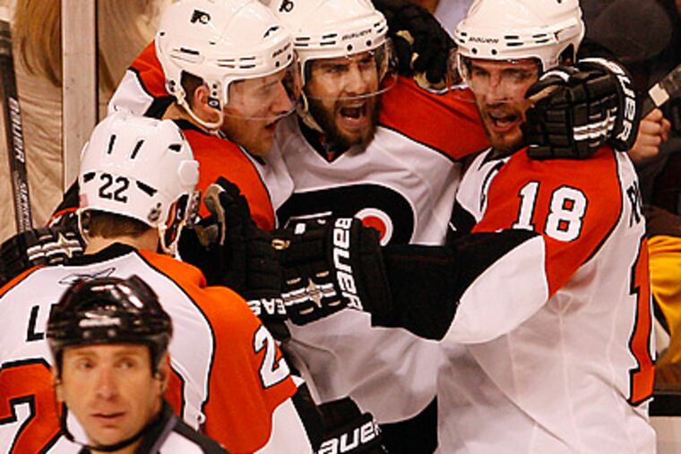 Simon Gagne celebrates his go-ahead goal in the third period that gave the Flyers the victory. (David Maialetti / Staff Photographer)