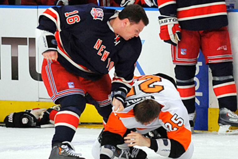 Sean Avery used Matt Carle's face as a punching bag the last time the Flyers and Rangers met. (AP file photo)