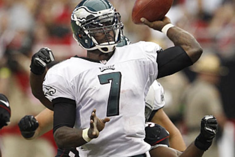 "It's something I know I can get corrected," Michael Vick said about turnovers. (Ron Cortes/Staff Photographer)