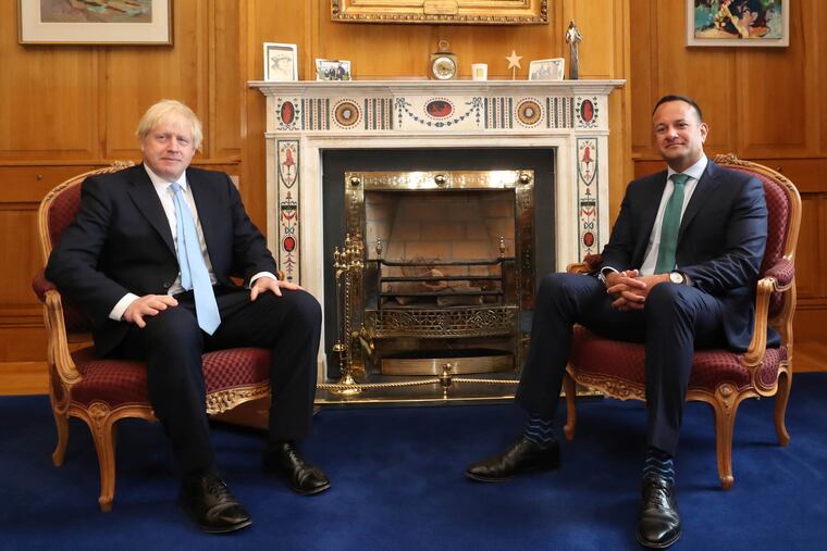 Britain's Prime Minister Boris Johnson (left) meets with Ireland's Prime Minister Leo Varadkar at Government Buildings in Dublin on Monday.