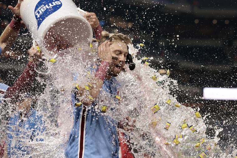 Phillies players pour the contents of the water cooler on Kody Clemens after Clemens knocked in the winning run in the bottom of the ninth inning of the Detroit Tigers at Philadelphia Phillies MLB game at Citizens Bank Park in Phila., Pa. on Thurs. June 8, 2023.