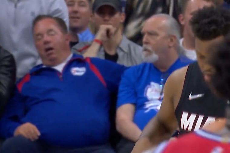 David Kelleher (left) was caught sleeping during the final second of the third quarter of the Sixers' Game 4 win over the Miami Heat.