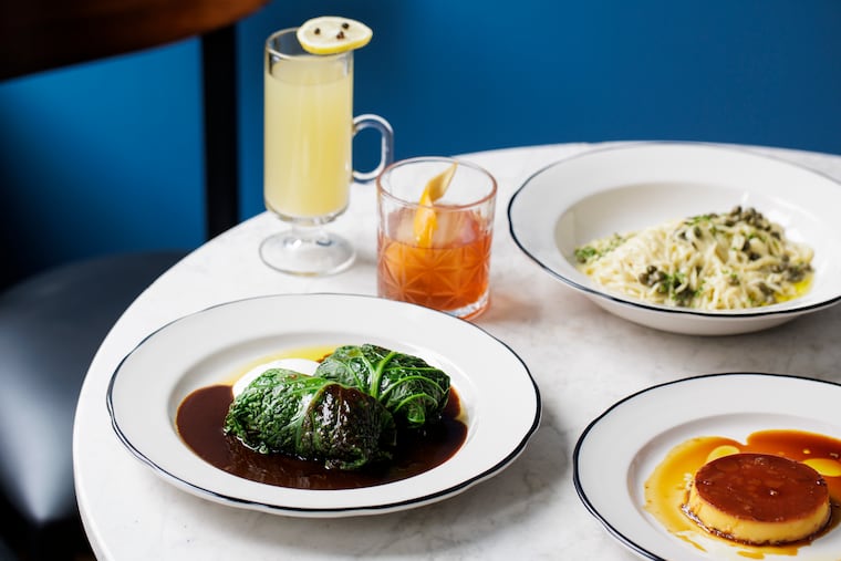 Stuffed cabbage, tagliolini, and crème caramel, alongside a hot penicillin and old fashioned, at Side Eye.