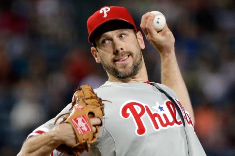 Cliff Lee throws in the first inning of a baseball game against the Atlanta Braves, Friday, Sept. 27, 2013, in Atlanta. (David Goldman/AP)