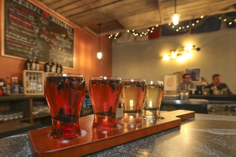 At Original 13 Ciderworks, a flight of Sir Charles Hard Apple Ciders.