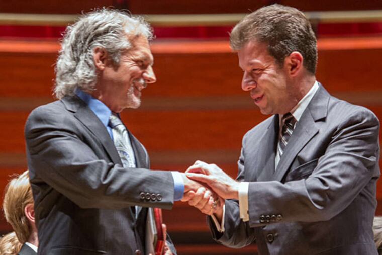 Wissahickon Middle School music teacher William Cain (left) with Phila. Youth Orchestra maestro Louis Scaglione.