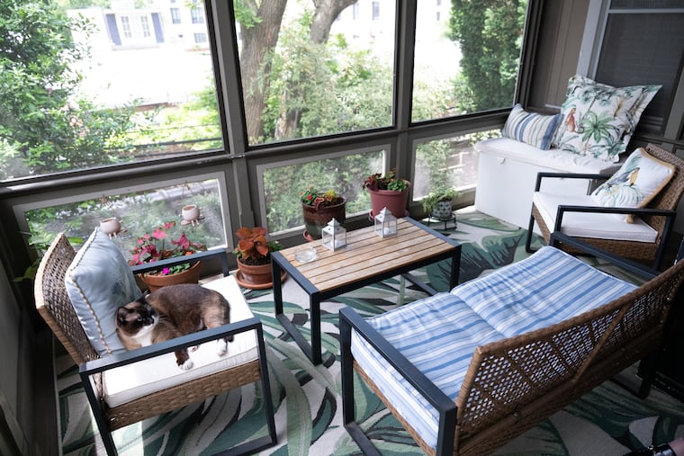 The screened-in porch on the second floor was a selling point.