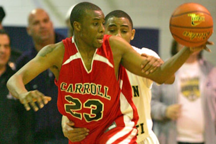 Archbishop Carroll's Juan'ya Green is fouled in the last seconds against Neumann-Goretti. (David Swanson / Staff Photographer)