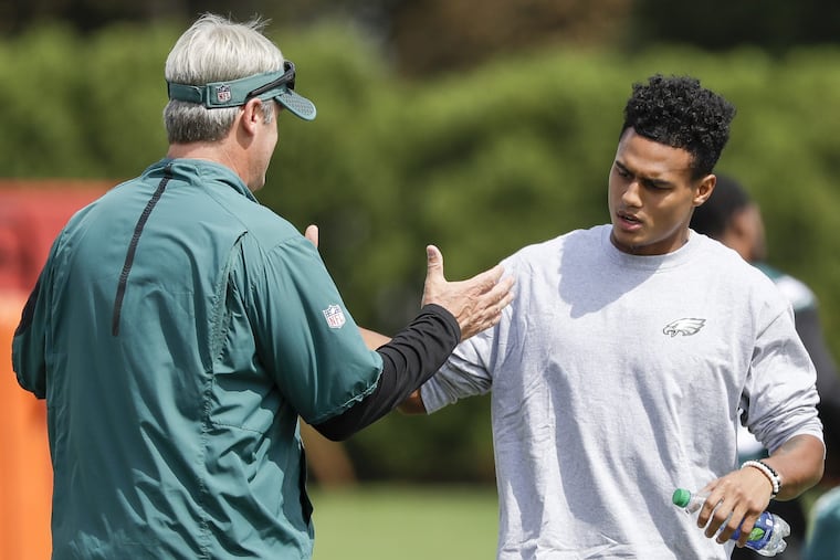 Eagles cornerback Dexter McDougle (right) is active for Sunday's game at the Kansas City Chiefs.