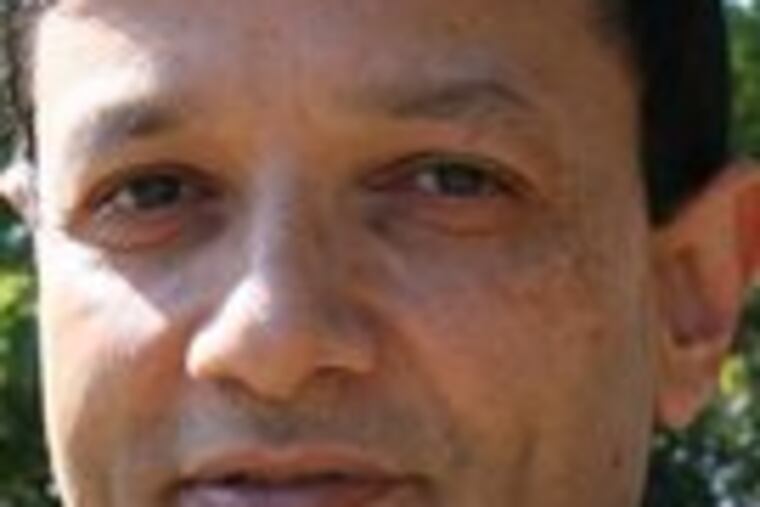 Amit Singh: New dean at college.